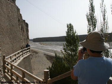 Mom (Ruby) taking picture of Dad (Peter) at Western Thousand Buddha Caves