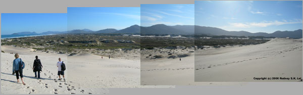 Kathy, Ana, and Chris cross the dunes to Joaquina Panarama