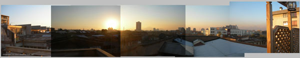 Sunset from the Happy House Hostal Terrace Panarama